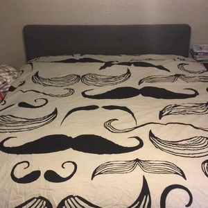 Comforter: gray and black mustache, twin